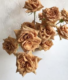 a bunch of flowers that are sitting on a table