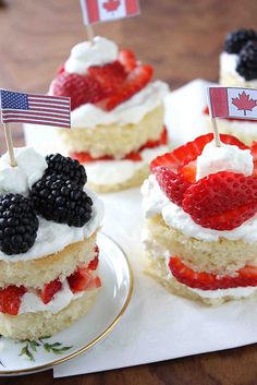 small desserts with flags and berries on them