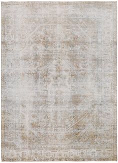 an antique rug with faded colors and patterns on the ground, in neutral tones that appear to be over - dyed