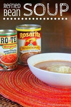 soup in a white bowl next to canned beans