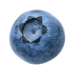 a blueberry is shown on a white background with a hole in the center that looks like a star