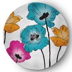 a plate with colorful flowers painted on it