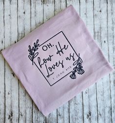 This listing is for a short sleeve lilac colored t-shirt with embroidery. Embroidered Lavender Cotton Top, Embroidered Cotton Lavender Top, Purple Short Sleeve T-shirt For Gift, Purple Cotton Tops With Embroidered Text, He Loves Us, Faith Tshirts, Sequin Appliques, How He Loves Us, Christian Shirt