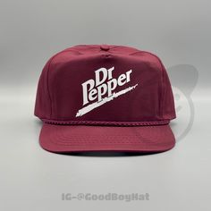 "Vintage Deadstock 80s/90s Retro Maroon Trucker Rope Snapback Hat w/ Dr Pepper Logo in White *Large Oldschool Fit* \"Dr.Pepper Boy\" * Maroon * One Size Fits Most * 5-Panel, Cotton Twill * High Profile, 3 ¾\" Structured Crown * Half-Moon, Rope * Snapback Closure **We try to provide every angle in the pictures so please read the description carefully of product listing, size, & fit description & measurements. Also please ask any questions about sizing prior to ordering if you are concerned. Follo Aesthetic Dr Pepper, Dr Pepper Sweatshirt, Vintage Dr Pepper Aesthetic, Dr Pepper Merch, Dr Pepper Vintage, Marvel Merchandise, Food Backgrounds, Dr Pepper, Snapback Cap