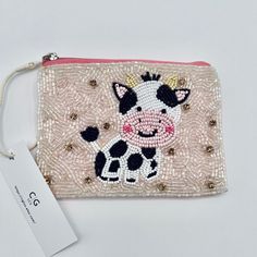 Farm animal coin purse, Pink Cow Bag, Farm animal Party, Barn Party, Pink Card Holder, Kids Gifts, Animal Party favor, Cute Girls Pink Bag.  This adorable coin purse is fully beaded on the front side and has a plain canvas on the back. Bag is lined with a zipper closure.  All sales final Cute Handmade Party Bags, Cute Animal Design Bags For Gift, Cute Animal Design Bag For Gift, Playful Pink Cosmetic Bag For Gift, Novelty Pink Bags For Gifts, Cute Coin Purse Pouch For Gifts, Cute Coin Purse Pouch As Gift, Playful Zipper Pouch Cosmetic Bag As Gift, Animal Design Pouch Bags As Gifts