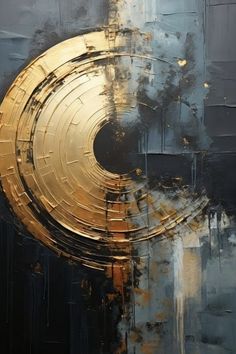 an abstract painting with gold and black paint on it's side, including the center circle