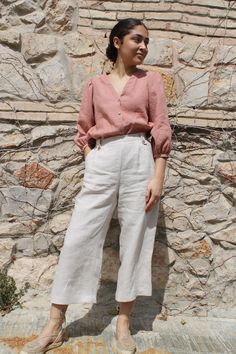 "SIZES AND DESCRIPTION  Croped linen pants.These pants have two pleats at the front waist and an elastic at the back to better adjust to your waist. They have a zip closure at the back. They have two interior side pockets and  An exterior back pocket. It is handcrafted in Spain with high quality 100% European linen. DETAILS   Oeko-Tex certified quality guarantee.  100% European linen (Lithuanian )of the best quality of a medium weight (185gr)  This linen is washed and softened to have a nice touch.  Linen is an ecological and breathable fabric as it is a 100% natural fabric.  It does not need ironing, since it is a washed linen and has natural wrinkles of the fabric.  Color-INDIGO .You can choose another color in our color chart.  The model is wearing size S. CARE * Gentle machine washing Womens Linen Pants, Egypt Outfits, Linen Pants Style, Beige Linen Pants, Linen Pants Outfit, Womens Trousers, Linen Pants Women, Colored Pants, Cultura Pop