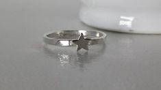 Now offering FREE SHIPPING on all US orders and 10% off all orders of $100 or more! Items ship in 1-3 days Show someone that you think they're a superstar with sterling silver! This little ring is perfect for celebrating life's little victories. - a stellar report card, job promotion, graduation, or a starring role in a school play. This adorable, whimsical ring is so simple, it's perfect to wear every day either all alone or stcked with my other sterling silver hammered rings. This ring is avai Sterling Silver Star Jewelry For Birthday, Sterling Silver Stackable Star Rings, Nickel-free Sterling Silver Star Ring, Silver Star-shaped Stackable Rings In Sterling Silver, Silver Star-shaped Stackable Jewelry, Stackable Silver Star Jewelry, Stackable Star-shaped Silver Jewelry, Adjustable Star Shaped Stackable Rings For Anniversary, Adjustable Star Shaped Stackable Rings As Gift