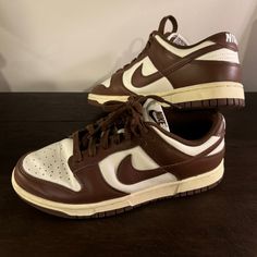 Brown Nike Dunk Low In The Cacao Wow/Coconut Milk Colorway. The Brown And Off White Colors Make The Shoe Have That Cool Old School Feel. Only Worn Once! Brown Nike Dunks, Milk Color, Nike Brown, White Colors, Nike Dunk Low, Off White Color, Dunk Low, Nike Dunk, Nike Dunks