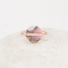 Pink Opal Ring - Natural Gemstone Ring - Silver Handmade Ring - Rose Gold Plated Ring - Gift for niece - Jewelry for healing -Trendy Jewelry Item Code: BJ7556 Metal: 925 Sterling Silver Plating: Rose Gold Plated Stone Detail:-  Pink Opal Copper 12x12mm Round Shape Gemstone #gemstonering #925sterlingsilver #silverring #18kgoldmicron #goldplated #pinkopal #ringjewelry #gemstonejewelry #opalring #ring #rosegoldring #opalgemstone #handmadering #ring #gemstone #flatring #silverjewelry To buy the Wooden box separately, please go on the below link: https://www.etsy.com/listing/1131941241 You can also go on our store home page and see the box listing to place your order.  * Please note that there will be slight variations in stone texture and color shades in the actual product that you receive. St Pink Opal Ring, Ring Rosegold, Natural Gemstone Ring, Opal White, Cool Gifts For Women, Mens Ring, Pink Ring, Opal Ring, Pink Opal