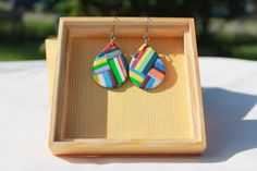 These large colorful dangle style earrings are handmade from polymer clay. They are a one-of-a-kind creation. The earring findings are stainless steel. Multicolor Polymer Clay Earrings, Colorful Polymer Clay Earrings As Gift, Earring Findings, Style Earrings, Polymer Clay Earrings, Clay Earrings, Wedding Shop, Jewelry Earrings Dangle, Etsy Earrings