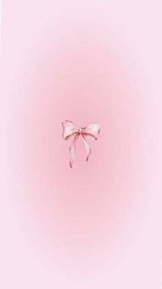 a pink wall with a bow on the top and bottom corner, in front of a light pink background