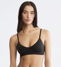 Seamless Sports Bra For Everyday, Seamless Sports Bra With Minimal Stretch, Everyday Seamless Sports Bra With Minimal Stretch, Everyday Seamless Triangle Top Bra, Seamless Compressive No-show Bra, Seamless Medium Support No-show Bra, Everyday Black Seamless Bra, Black Seamless Everyday Bra, Seamless Triangle Top Sports Bra For Loungewear