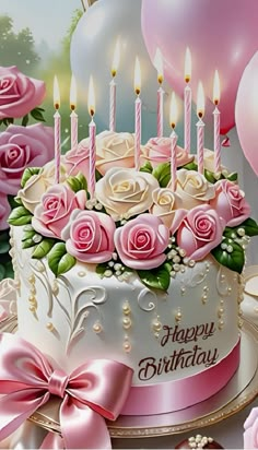 a birthday cake with pink roses and candles