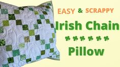 the irish chain pillow is made with green and white quilting on it's sides