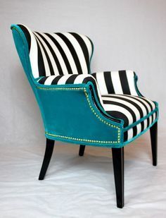 a blue chair with black and white stripes on it