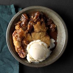 a bowl filled with dessert and ice cream