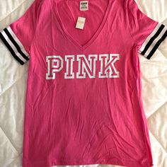 New With Tags!!! Comfortable And Lightweight Fabric “Pink” In White Lettering Striped Detail On Sleeve Cuff Size Medium Pit To Pit: 17” Length: 25” Pink V-neck T-shirt With Letter Print, Trendy Pink V-neck Top, Sporty Pink T-shirt For Loungewear, Trendy Pink V-neck T-shirt, Pink Cotton V-neck T-shirt, Light Purple Shirt, Hot Pink Shorts, Future Outfit, Pink Neon