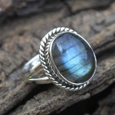 OOak Blue Fire Labradorite Ring -Oval Cabochon Labradorite Gemstone Ring -925 Sterling Silver Ring- Natural Labradorite Designer Gift RingLabradorite is known for its qualities of "magic" including clairvoyance, psychic powers, telepathy, communication with higher and inner wisdom and guides. Known as a gemstone of adventure, Labradorite is said to help one set off and move swiftly on the inner path and on higher journeys.Size/Dimension (Approx) : All Sizes AvailableGemstone : LabradoriteStone S Orange Ring, Blue Gemstone Rings, Black Moonstone, Bold Rings, Labradorite Jewelry, Citrine Ring, Labradorite Ring, Blue Fire, Ring Oval