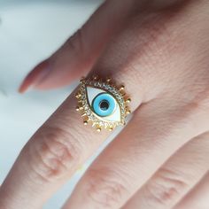 Evil Eye Ring | Hand Painting Blue Eye Ring, 925 Sterling Silver, Handmade Eye Ring, Eye Amulet, Adjustable Evil Eye Ring, Witch Ring Evil Eye Handmade Ring 🧿 Product Details; - Crafted with High Quality 925 Sterling Silver - 14k Gold-Plated - Unique and delicate design - The ring is adjustable easily by hand that will fit on your fingers ✈️✈️✈️ EXPRESS & FREE SHIPPING ✈️✈️✈️ - All items come in nicely packaged beautiful jewelry boxes ready to gift - All of our products are exclusive. - All of Unique Gold Enamel Ring, Blue Enamel Round Rings, Evil Eye Ring Jewelry Gift, Blue Enamel Open Ring Jewelry, Gold Enamel Ring In Sterling Silver, Gold Enamel Ring In Sterling Silver Fine Jewelry, Fine Jewelry Enamel Open Ring For Gift, Gold Open Enamel Ring In Sterling Silver, Enamel Open Promise Ring