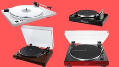 four different types of turntables on a red background