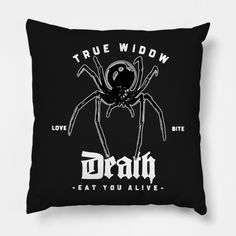 a black pillow with the words true widow and a spider on it's back