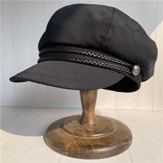 This stylish hat features a classic black newsboy cap design, crafted from a blend of 80% cotton and 20% polyester. The cap is adorned with a braided leather chain and vintage rivet buttons on the sides, enhancing its overall texture and adding a touch of sophistication. Its eight-panel structured construction ensures a comfortable and flattering fit. I provide 6 sizes for this vintage style newsboy cap. Specifications Material: 80% cotton, 20% polyester Color: Versatile black Decoration: Leathe