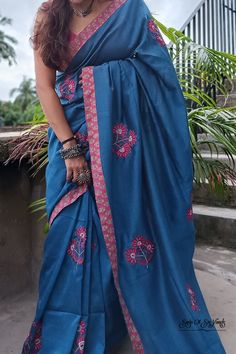 This blue handloom soft cotton saree is a true embodiment of style meeting comfort. With its beautiful floral motif embroidery, neatly done, and the addition of a printed border and tassels, it becomes a captivating and unique piece. The inclusion of both a running blouse piece and a matching cotton printed blouse piece adds further flexibility, allowing you to showcase your style effortlessly in any occasion. Details: Blouse: Yes. With matching printed cotton Blouse Piece Fabric: Handloom soft cotton saree Work: Machine Embroidery work [* This work is neither Computerized Machine Embroidery work nor machine Aari Embroidery with woolen thread. * It's completely Manual Machine Embroidery Work with silk threads..] Saree length:  6.3 mtrs Saree width: 45 inches Fall & Picot: You do not need a Soft Cotton Saree, Saree Work, Motif Embroidery, Embroidered Saree, Aari Embroidery, Wear Saree, Cotton Blouse, Silk Thread, Embroidery Work