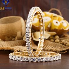 Welcome to our listing for a stunning Diamond Pendant that will leave you truly mesmerized! We are blessed with 5000+ satisfied customer with great response. Bracelet-81 ✥ 𝐌𝐚𝐢𝐧 𝐒𝐭𝐨𝐧𝐞 𝐃𝐞𝐭𝐚𝐢𝐥𝐬 ↣ Shape : Round Cut ↣ Type : CVD/HPHT ↣ Weight - 39.78 TDW - 570 Diamond   (0.50 Round EF VS - 70 Diamond)   (0.008 Round EF VS - 500 Diamond) ↣ Gold Weight (Yellow Gold) : 10 K - 66.90 gm 14 K - 67.05 gm 18 K - 67.20 gm Comes in jewelry box  Celebrate your love story with a symbol as unique as your relationship. This extraordinary diamond engagement ring captures the essence of timeless romance and modern artistry in one breathtaking piece. 🌟 *Sparkling Diamonds:* Imagine dazzling diamonds that are created using innovative technology, without harming the environment. we offer these be Gold Bracelet Bangle, Yellow Gold Bangle, Cvd Diamond, Bangle Designs, Gold Bangle Bracelet, Diamond Bangle, Yellow Gold Bracelet, Diamond Gold, Bracelet Bangle