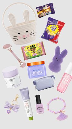 the contents of a bunny bag are arranged on a white background, including cosmetics and other items