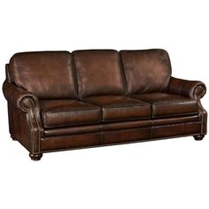 a brown leather couch sitting on top of a white background