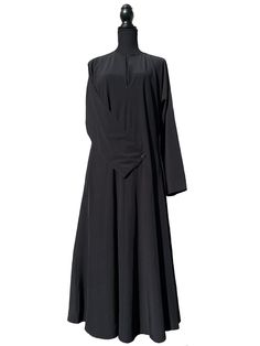 Introducing our Essential Abayas. With optimum comfort yet elegance of our soft crepe fabric these abayas are great for any occasion, and...they have pockets We know you needed one so we've got you covered...literally! Description Model is 5'1" tall and is wearing a size 52 in our Essential Abaya Side pockets 8" front zipper for easy wear and suitable for nursing mothers A-Line Silhouette Comes with tie-belt Fabric: The abaya is made of soft crepe which is light weight so it is suitable for warmer weather, offers beautiful drape, shine and durability. Formal Long Solid Abaya, Elegant Solid Color Abaya With Modesty Panel, Formal Modest Thobe, Modest Long Thobe For Formal Occasions, Head Coverings, Nursing Mother, Beautiful Drapes, Crepe Fabric, Head Covering