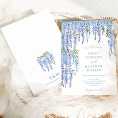 wedding stationery with wistery flowers on it