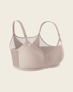 This bra is multitalented, just like you! Its double-layered criss-cross band design pulls your shoulders back to help you sit up straight. This innovative style may relieve back pain by correcting your posture. Double-layered contour cups support your bust, giving you excellent coverage and a great shape. The wide, soft, adjustable straps of this bra are extra supportive to relieve shoulder stress. Supportive Light Support Push-up Bra, Supportive Beige Sports Bra With Built-in Bra, Supportive Push-up Sports Bra With Built-in Bra, Supportive Push-up Sports Bra, Supportive Full Coverage Bra With Medium Bust Support, Supportive Push-up Bra, Supportive Yoga Bra With Medium Bust Support, Light Support Push-up Bra, Full Coverage Nursing Bra For Yoga