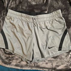 Nike Women’s Dri-Fit Shorts In Grey And Black. Elastic Waistband With Drawstring. Hidden Mesh Inner Back Pocket. Size: M 100% Polyester 16.5” Across 12” Out Seam 5” Inseam Nwt. Nike Gray Workout Shorts, Nike Gray Stretch Shorts, Nike Gray Athleisure Shorts, Nike Gray Athletic Shorts, Gray Go-dry Shorts, Workout Fits, Comfy Clothes, Shorts Nike, Shorts Athletic