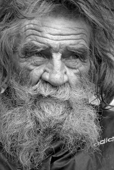 an old man with long hair and beard