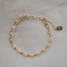 Our Pippa Pearl Bracelet is dainty + modern! What do we love about it? The tiny pearl accents add just a touch of traditional style in a modern way! This bracelet is perfect for any bridal event but can also be worn any time of the year or for any occasion which makes this the perfect gift! BRACELET FEATURES Materials: Brass, 14K Gold, Rhodium, Faux Pearl Finish: Choice of Yellow Gold or Rhodium Plating Dimensions: 6.5" with a 2" extender (can be worn up to 8.5") 14K gold-filled or sterling silv Pearl Bracelets, Gold Pearl Bracelet, Jewelry Accessories Ideas, Bohemian Necklace, Gold Bracelet Chain, Christian Jewelry, Bridal Bracelet, Yellow Gold Chain, Pearl Chain