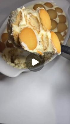 a bowl filled with ice cream covered in eggs