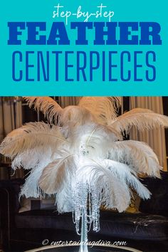 a centerpiece with white feathers on it and the words step - by - step feather centerpieces