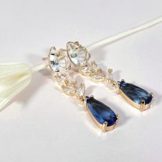 This Wedding Earrings item by DazzlingLilia has 5 favorites from Etsy shoppers. Ships from Houston, TX. Listed on Apr 3, 2024 Blue Fine Jewelry Earrings For Wedding, Sapphire Drop Earrings For Formal Occasions, Teardrop Wedding Earrings With Plating, Elegant Sapphire Bridal Earrings For Gift, Sapphire Earrings For Wedding, Teardrop Wedding Earrings, Earrings For Bride, Earrings Necklace Set, Wedding Elegant