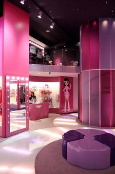 the inside of a pink and purple store