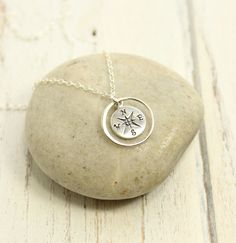 Entirely sterling silver, this necklace features a beautifully detailed compass, inside of a 15mm circle, hanging on sterling cable chain. The compass is 15 x 10 x1mm and is sterling silver (not plated). Please select your length from the drop menu or type your length request in the order comments. About Packaging / Sentiment Card: The standard gift box will include the necklace matted on decorative card stock and placed in a gift box, tied with fabric ribbon. However, this beautiful piece lends Sterling Silver Necklace With Round Pendant For Travel, Compass Design Round Necklace, Compass Design Round Jewelry For Gift, Compass Design Round Jewelry Gift, Sterling Silver Round Pendant Jewelry For Travel, Silver Medallion Charm Necklace With Compass Design, Sterling Silver Compass Necklace For Travel, Sterling Silver Compass Design Necklace For Travel, Adjustable Compass Design Round Jewelry