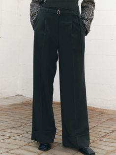 Editor's notesSophisticated longwide pants with turn-up detail and luxurious belted points. The pants featurethe proper amount of turn up details and you can adjust as you want, the beltloops on waistline are finely made with bar tack sewing. Made with polyesterand rayon mixed fabric, the proper thickness of the pants allows you to wear itin all seasons. It also accentuated the side pockets details and elastic fabricto add comfort to the pants. - Turn updetails on the hem- Belted point- long lengthwide fit- Soft andcomfortable fabric to wear in all seasons- Practical pocketson the side Measurements(in.)SIZE (S/M)- Waist: 13.38in / 14.37 in- Hip: 19.29 in/ 20.27 in- Hem: 11 in /11.41 in- Thigh: 12.79in / 13.18 in- Front Rise:13.58 in / 13.97 in- Length: 39.37in / 39.76 in*Measurem Evening Ankle-length Pants With Belt Loops, Non-stretch Full Length Pants With Belt Loops, Mid-rise Black Pants With Contoured Waistband, Stretch Wide Leg Full-length Pants With Belt Loops, Black Full-length Pants With Belt Loops, Turn Up, Wide Pants, Mixing Fabrics, Pocket Detail