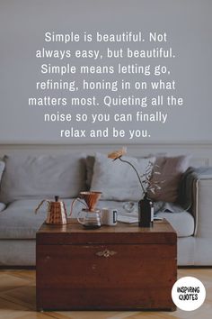 a living room with a couch and coffee pot on top of it, next to a quote about simple is beautiful not always easy