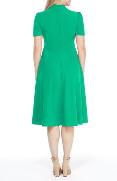 This dainty short sleeve dress is a retro inspired staple that's perfect for any well-dressed occasion. 45" length Necktie Short sleeves Back zip closure Lined 96% polyester, 4% spandex Hand wash, dry flat Imported Model Stats: 5'10" height; 34" bust; 27" waist; 35" hips. Maggy London, Short Sleeve Dress, Stuffed Green Peppers, Well Dressed, Necktie, Retro Inspired, Sleeve Dress, Nordstrom Rack, Neck Tie