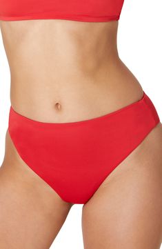 A '90s-inspired high waist defines these bikini bottoms fashioned with a versatile solid hue and cheeky back coverage. Cheeky back coverage   80% recycled nylon, 20% spandex   Hand wash, dry flat   Imported Red Seamless Bottoms For Poolside, Bold Stretch Bottoms For The Beach, Bold Red Bottoms For Summer, Seamless Red Bottoms For Beach Season, Red Brief Swim Bottoms, Red High-waisted Swimwear For Pool, Red High Waist Tankini For Poolside, Red High-waist Tankini For Beach Season, High Waist Red Tankini For Beach Season