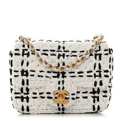 This is an authentic CHANEL Raffia Effect Tweed Braided Mini Flap in White and Black. This chic bag is crafted of woven tweed. The bag features a gold chain-link shoulder strap threaded with ivory leather.  The flap opens with a polished gold CC Chanel turn lock to a raffia interior with a zipper pocket. Designer Crochet Woven Bag, Luxury White Woven Bags, White Luxury Crochet Bag, Luxury Handwoven Shoulder Bag, Luxury White Crochet Bag, Designer Tweed Shoulder Bag Rectangular, Designer Tweed Bags In Rectangular Shape, Designer Tweed Rectangular Bag, Designer Tweed Rectangular Shoulder Bag