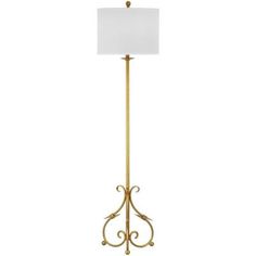 a floor lamp with a white shade on the base and a gold metal frame around it