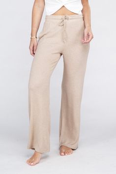 The Cozy Terry Lounge Pants are the epitome of comfort and casual chic. Crafted from a soft and cozy terry fabric, these pants provide the perfect balance of comfort and style. The elastic drawstring waist ensures a customizable and secure fit, making them ideal for lounging around or running errands in ultimate comfort. 76% Rayon, 20% Polyester, 4% Spandex Machine wash cold, gentle cycle, tumble dry low. Size Measurement (inch): S: 14.0 (Waist), 17.5 (Hips), 29.0 (Inseam), 39.0 (Length) M: 14.5