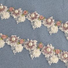 lace with flowers and pearls on a blue background